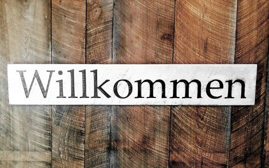 Willkommen Sign